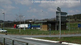 the parking and facilities at the Loutre aire. Motorway in the background.