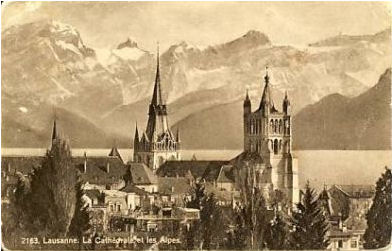 1924 'real photo' of Lausannre cathedral, with lake Geneva and the Alps beyond