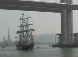 Tall ship Belem passing under the sixth bridge, Rouen cathedral in distance.