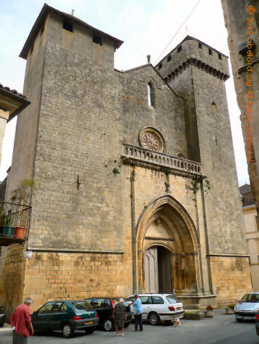 The church's west door and fortified towers