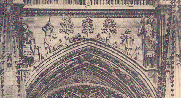 Showing David and Goliath far above the main porch  of the west facade on Reims cathedral