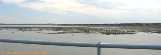 Oyster beds in in the straits between island and mainland, seen from the Ile d'Oleron bridge