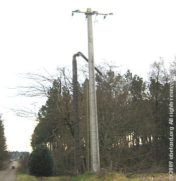 Broken electricity pylon with replacement, February 2009
